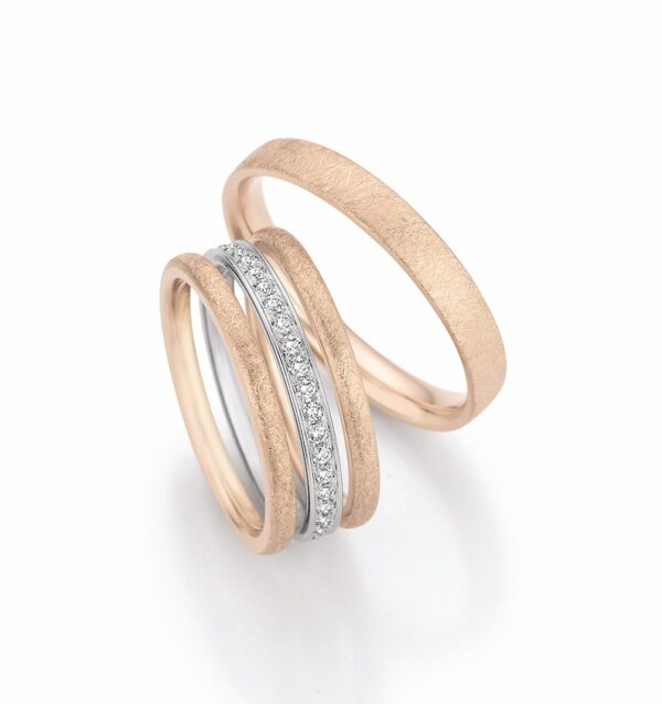 Collection Reusch: Trauringe aus Roségold und Diamanten