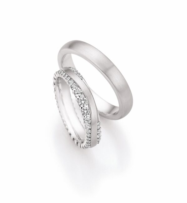 Collection Reusch: Trauringe Honeymoon und Diamanten