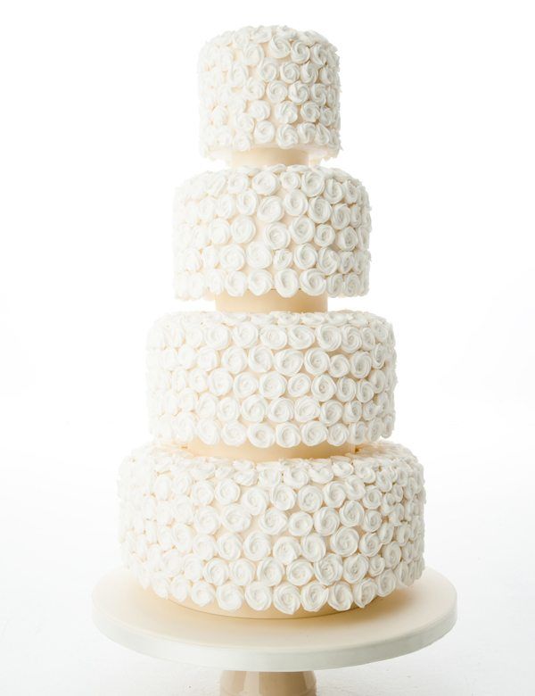 vierstöckige Hochzeitstorte in Weiß